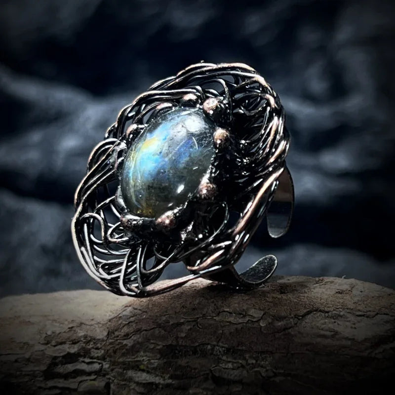 black gemstone engagement ring
