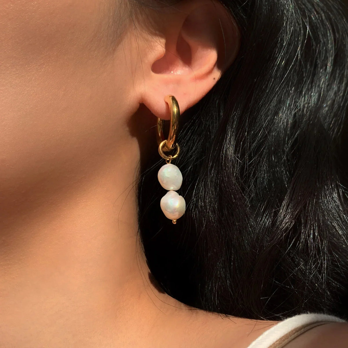dangling pearl earrings