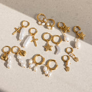 gold and pearl dangle earrings