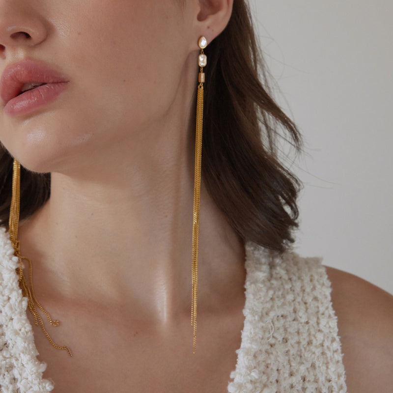 gold earrings with tassels