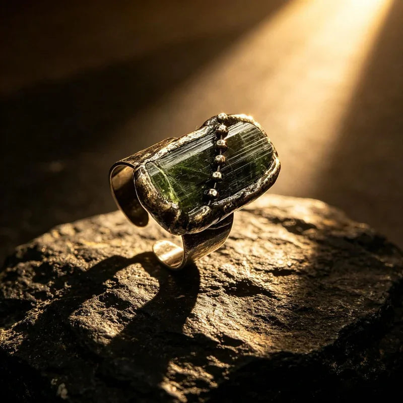 green gemstone engagement rings