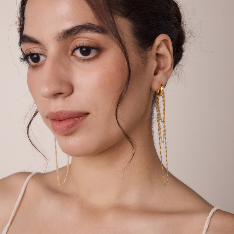 stud earrings on women