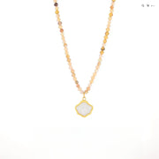 white gemstone necklace