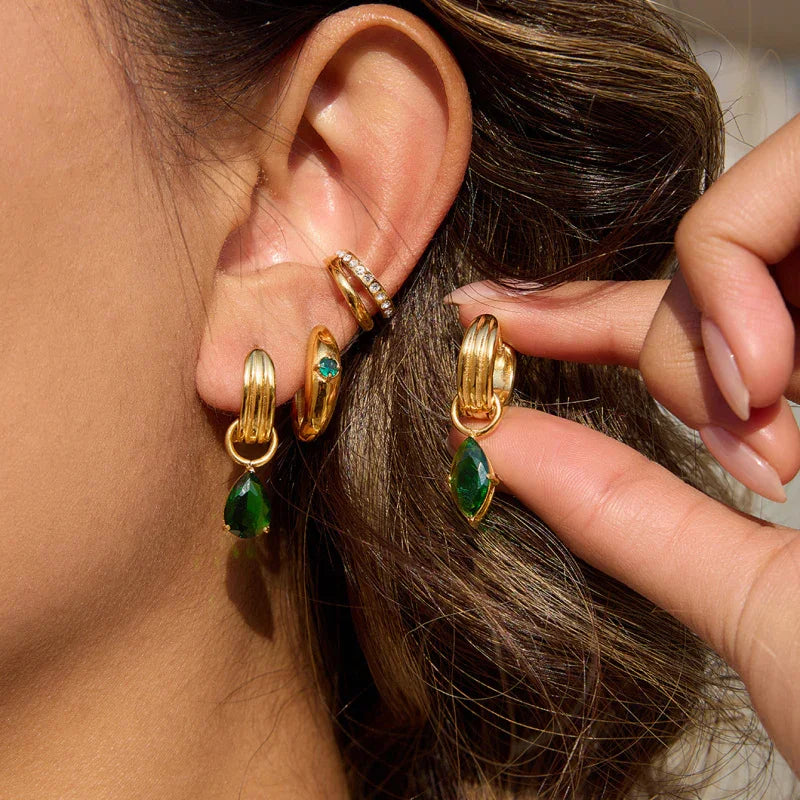 zircon rings with green stone